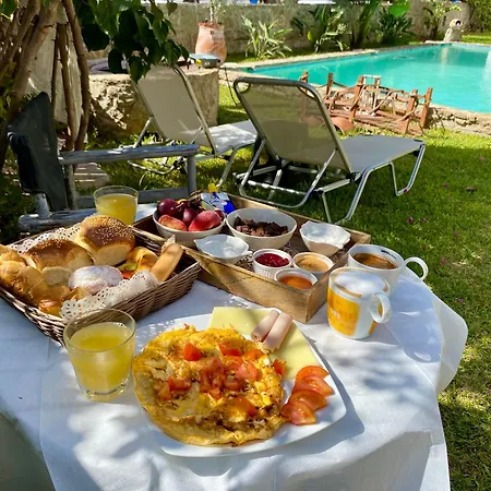 Irene's Maisonette At Rafaella Коккони